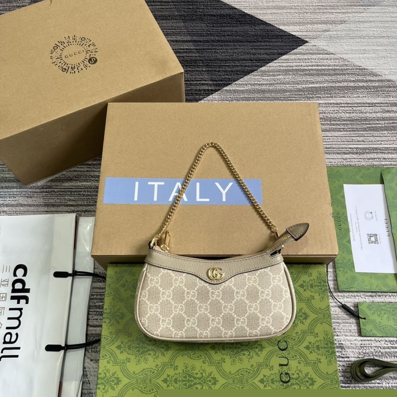 G*u*i top handle bags